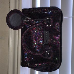 Holographic Steve Madden cosmetic/small purse.